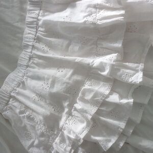 white ruffled mini skirt